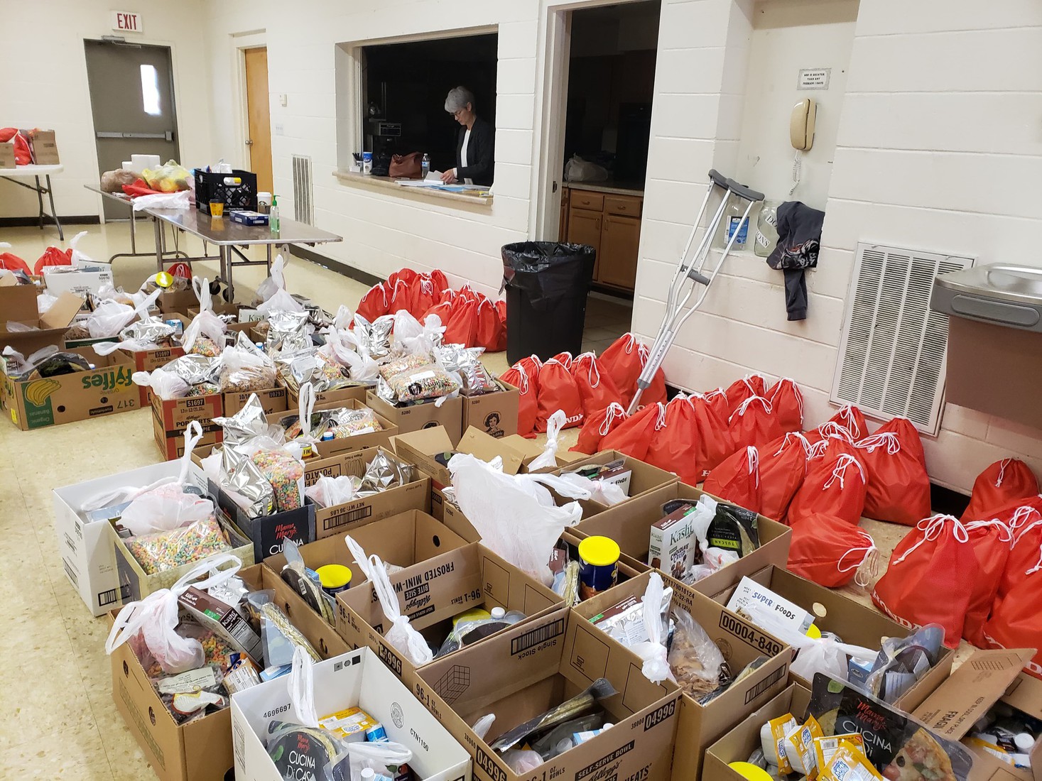 Boxes of food lined up in a room