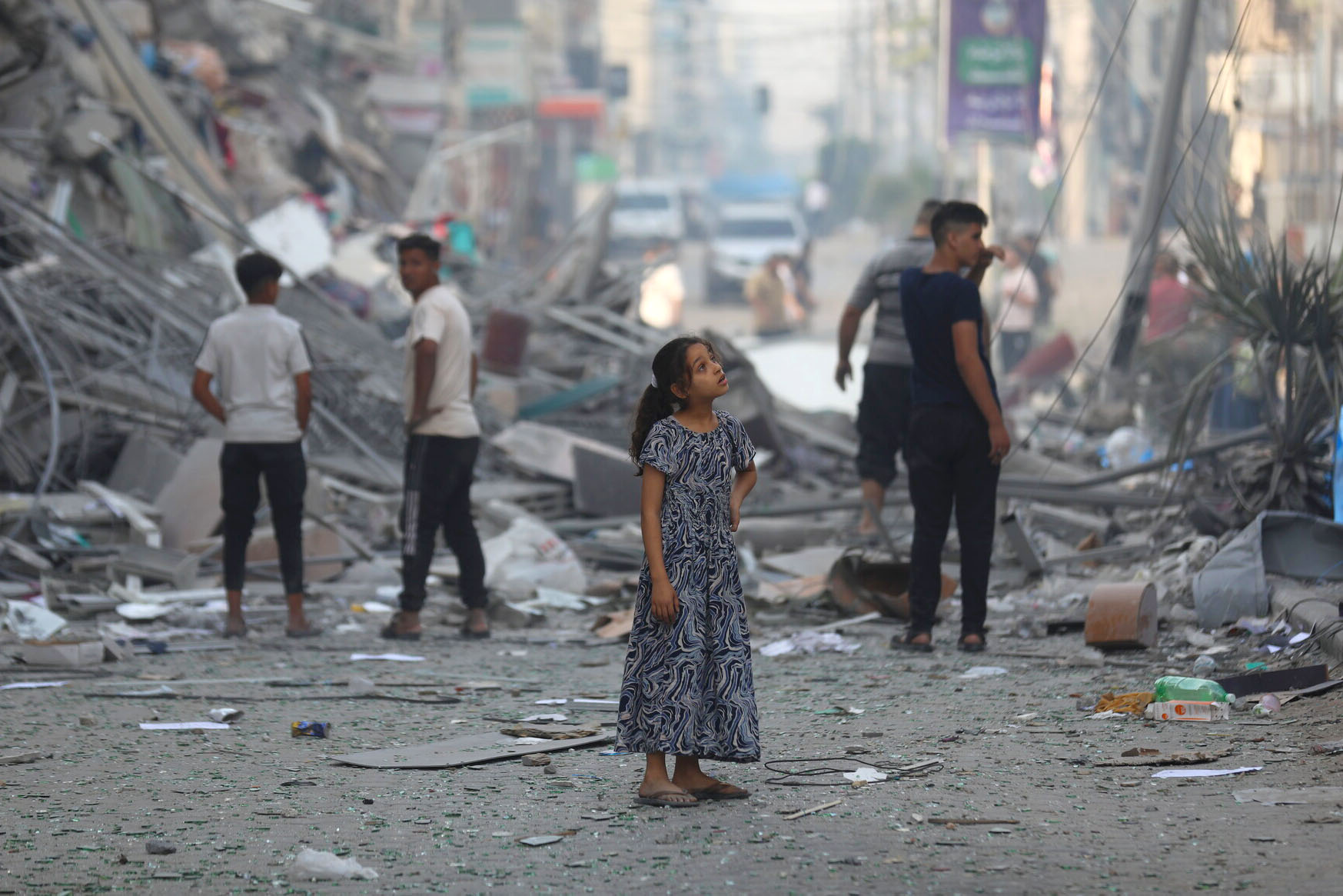 Girl standing in the ruins of Gaza