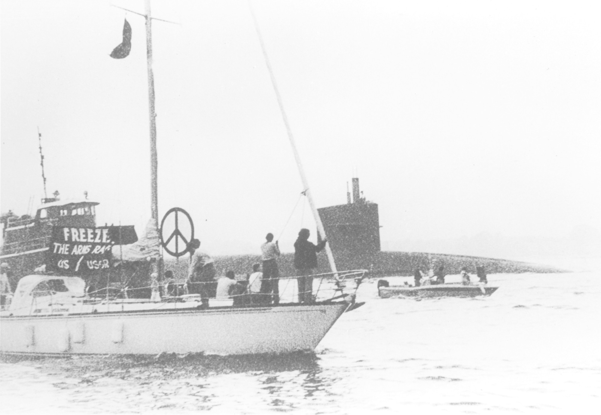 Boat with peace and anti-war signs