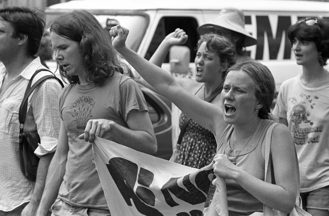 Protesters with signs