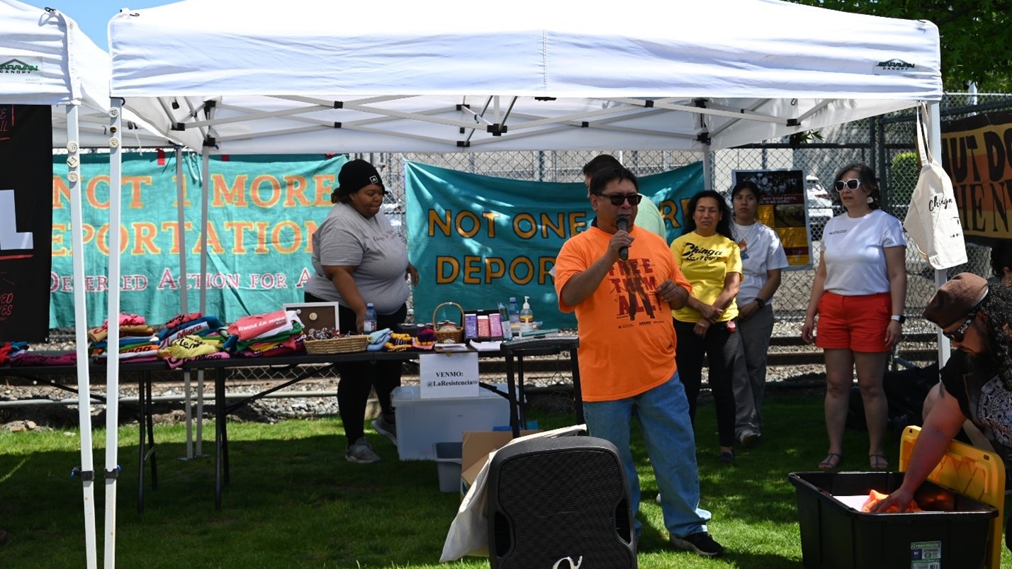 Pedro Sosa speaks outside the Northwest Detention Center at Tacoma, WA.