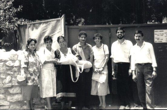 Group shot of several people standing outside