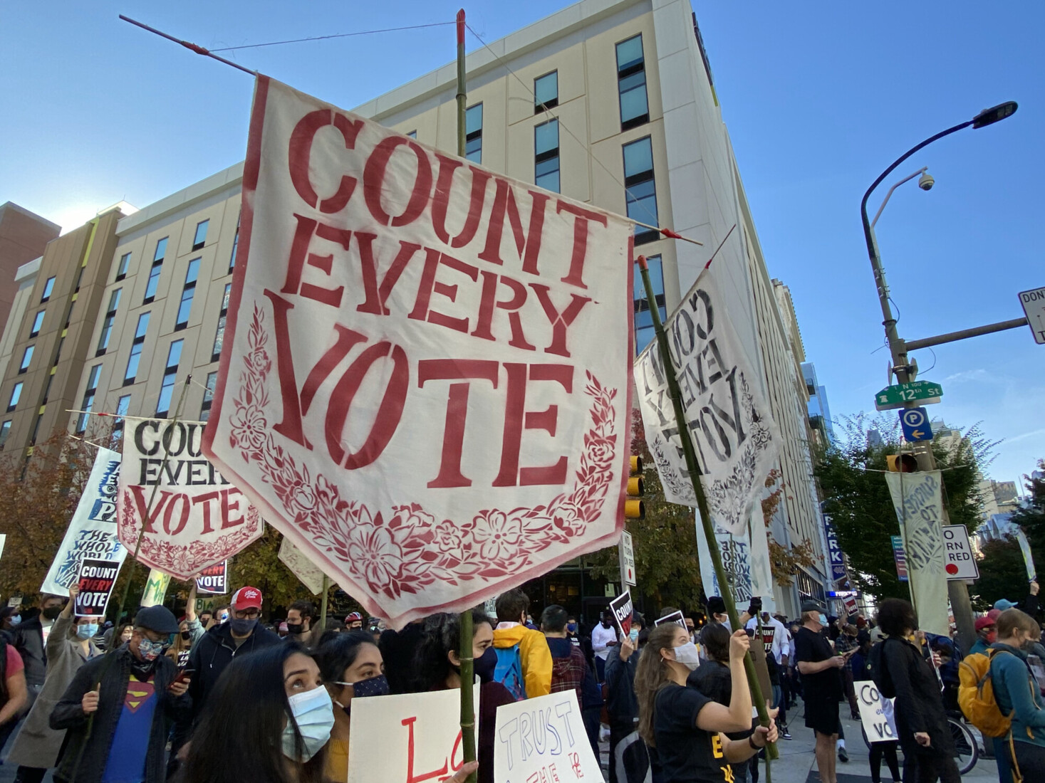 Rally with big sign that says 