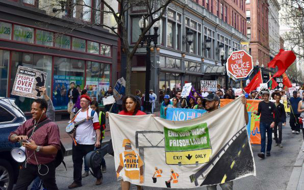 On May Day, community members displayed their support for the Community Safety Act. Photo: Steve Alquist/RI Future